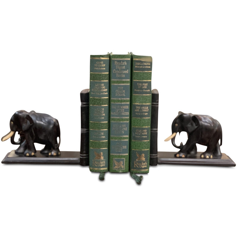 Elephant bookends with green antique books