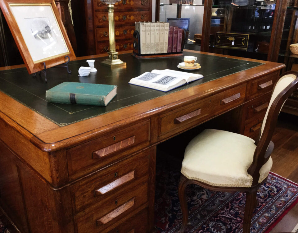 Antique desk and chair with green leather inlay