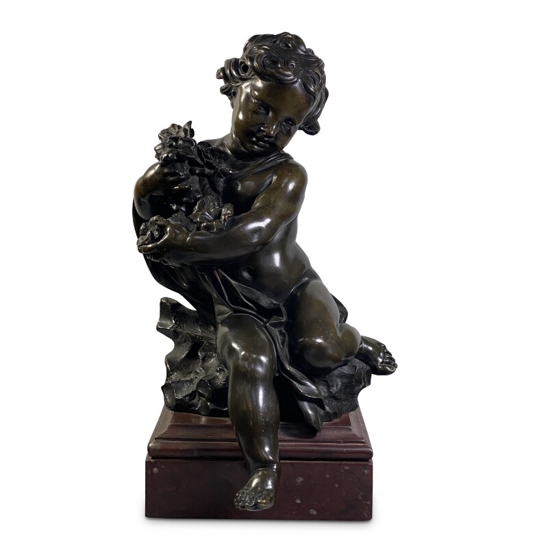 Bronze figure of a child holding a floral arrangement c. 1800