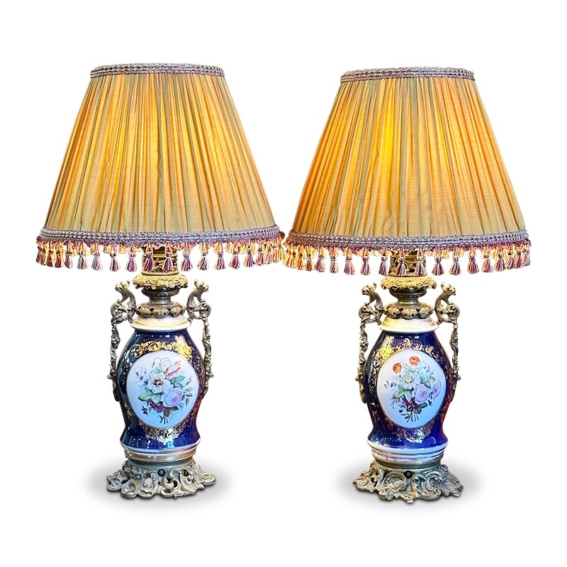 Pair of French antique lamps with blue floral ceramic bases and cream shades