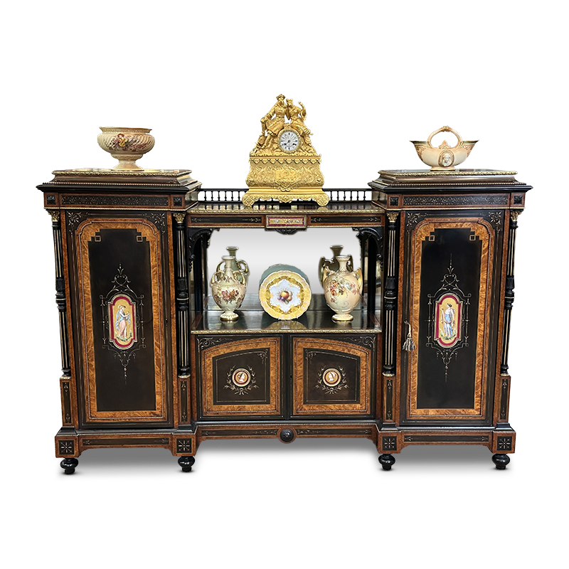 English 4 door breakfront ebonised credenza, cross banded with amboyna, hand painted Sèvres panels and ormolu mounts, c.1870. Pictured with a selection of Royal Worcester items and French gilt bronze Moroccan mantle clock.