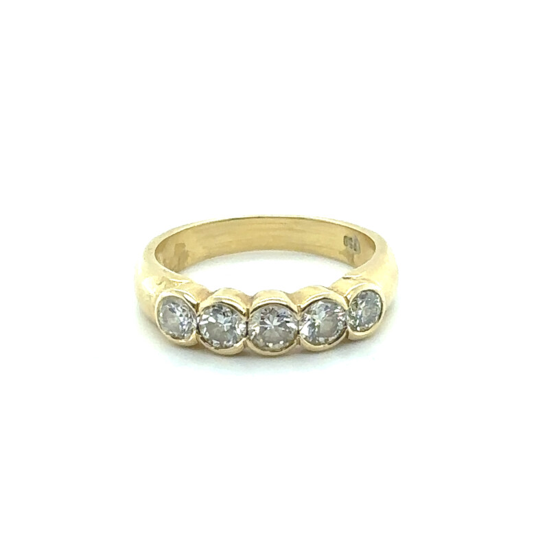 gold and diamond ring with 5 diamonds set in yellow gold