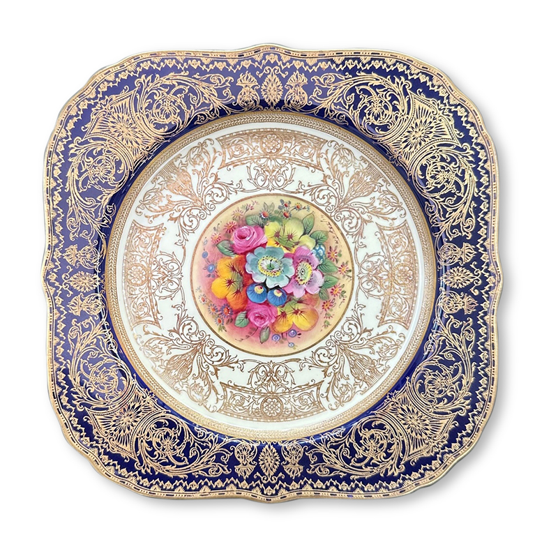 Set of 12 Royal Worcester plates featuring gold gilding and hand painted floral design on square shaped plate with rounded corners