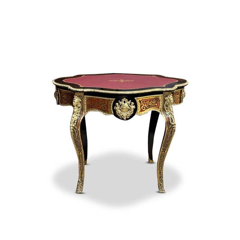 French boulle writing table with gold inlays and a red leather top