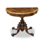 exquisite burr walnut card table with intricate inlays and carved pedestal base