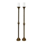 brass torcheres with candles