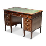 Edwardian desk with tooled leather top