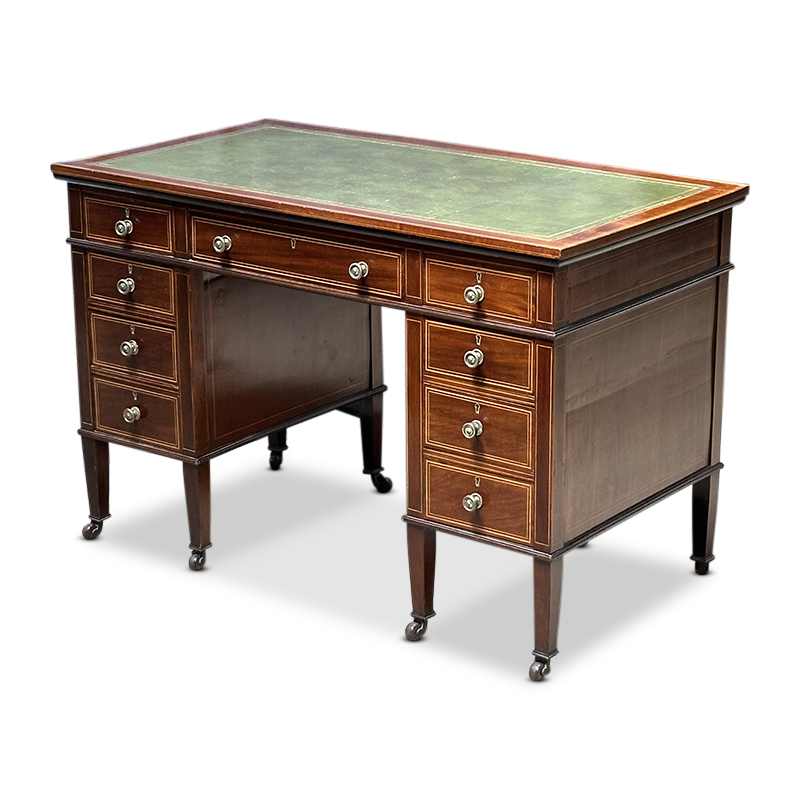 Edwardian desk with tooled leather top