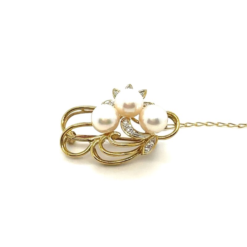 gold and pearl brooch