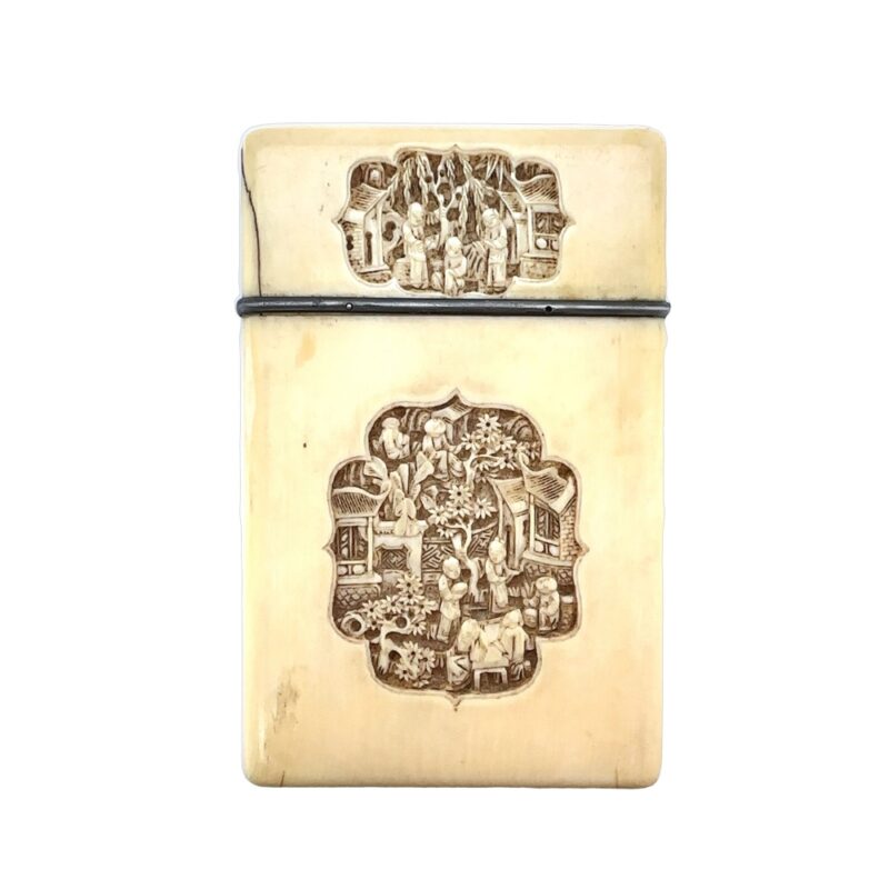19th century ivory card case with silver rim and intricate carvings