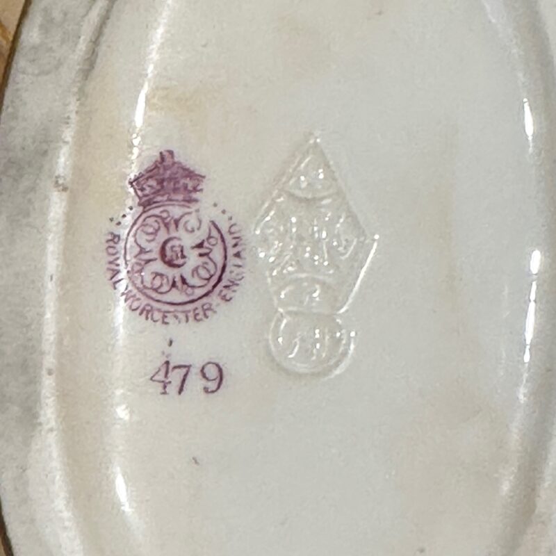 Royal worcester vase with masks