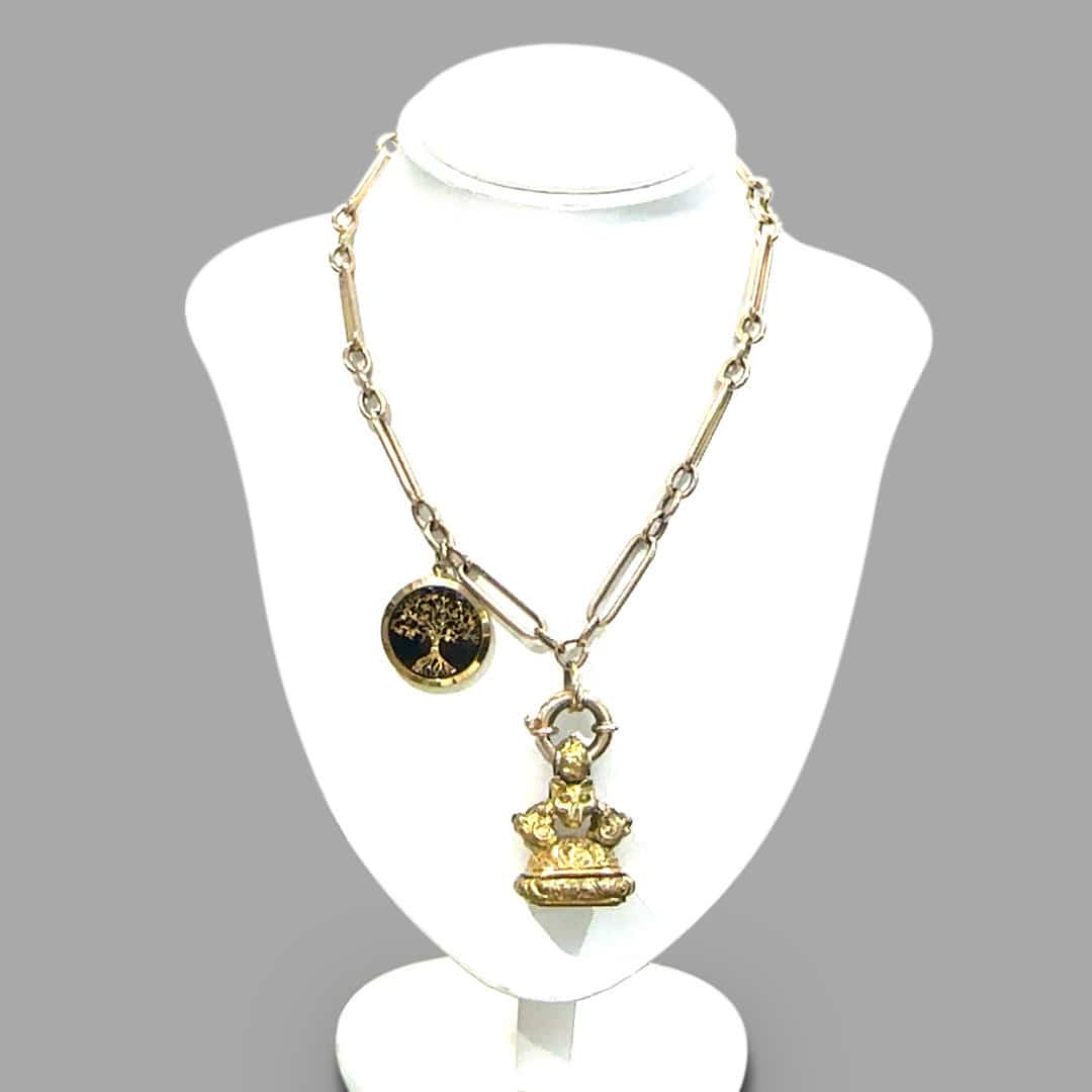 Gold fob chain with seal and pendant