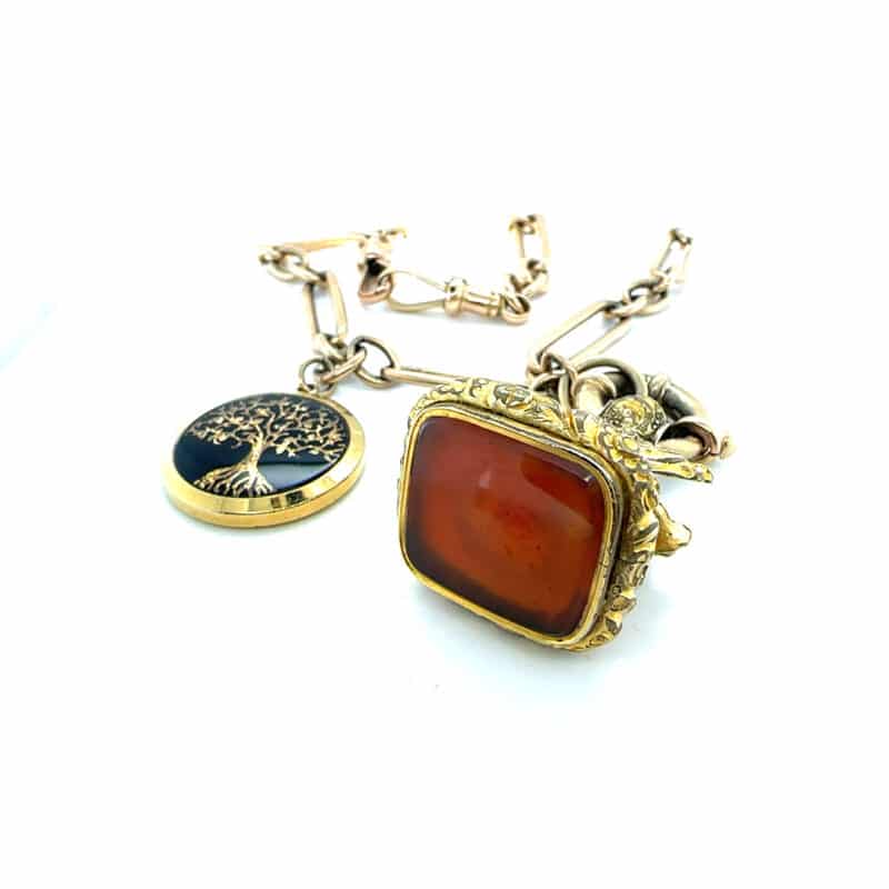 Gold fob chain with seal and pendant