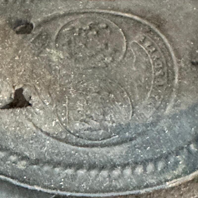 Antique ash iron mark