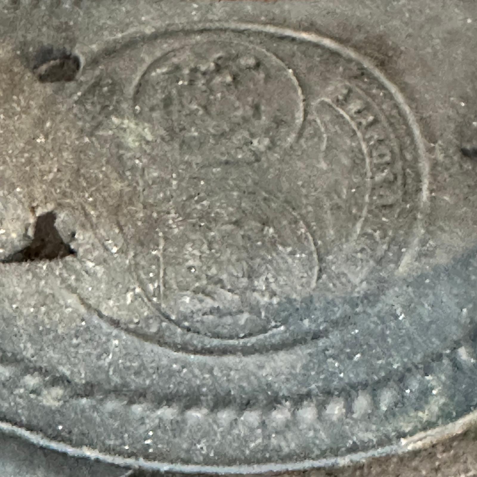 Antique ash iron mark