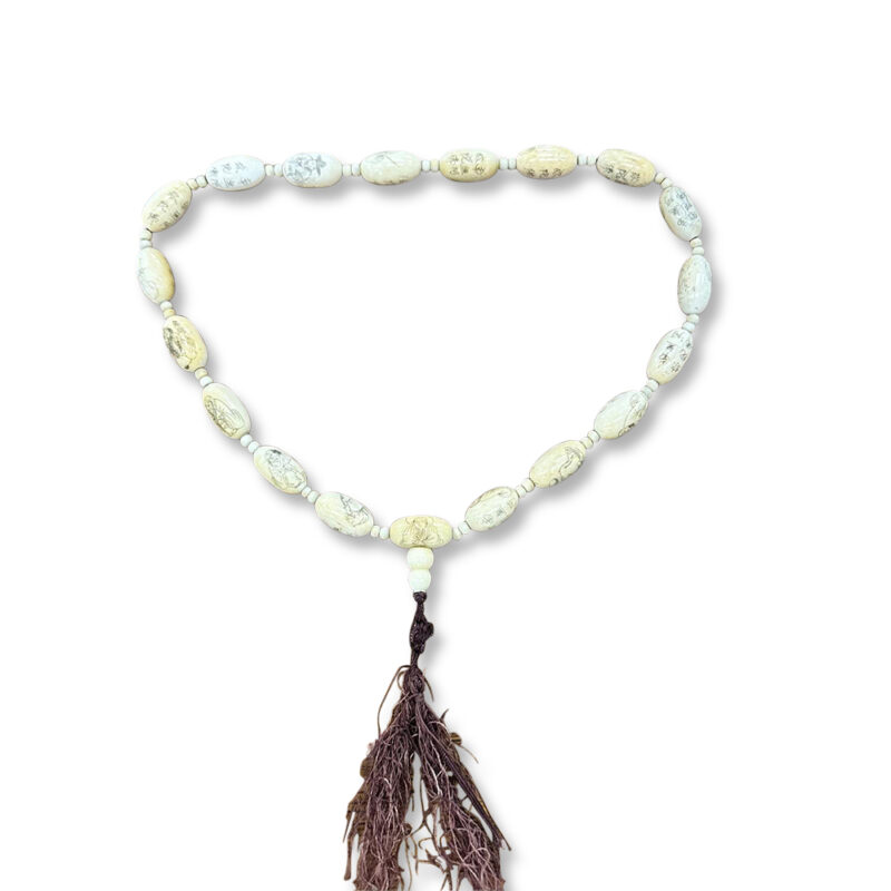 Engraved ivory beaded necklace with tassel