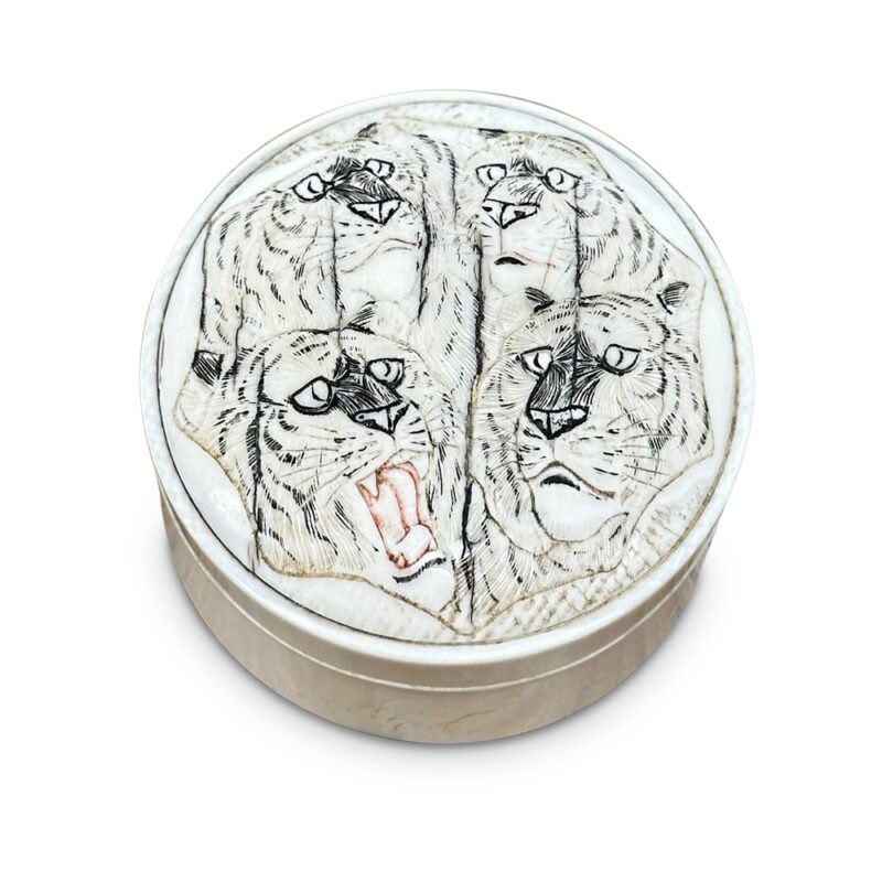 Ivory lidded box with four tigers
