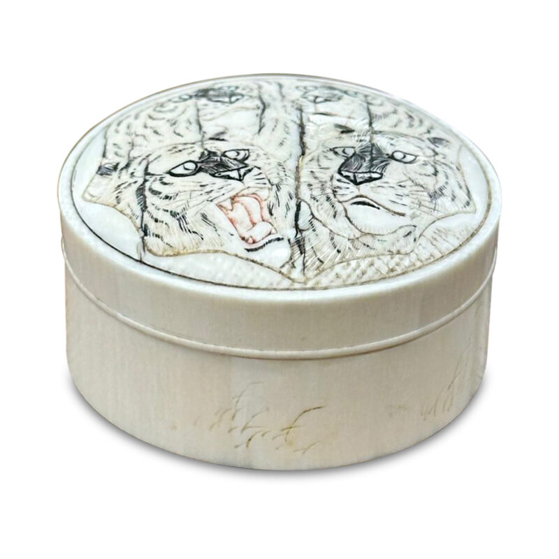 Ivory lidded box with four tigers side