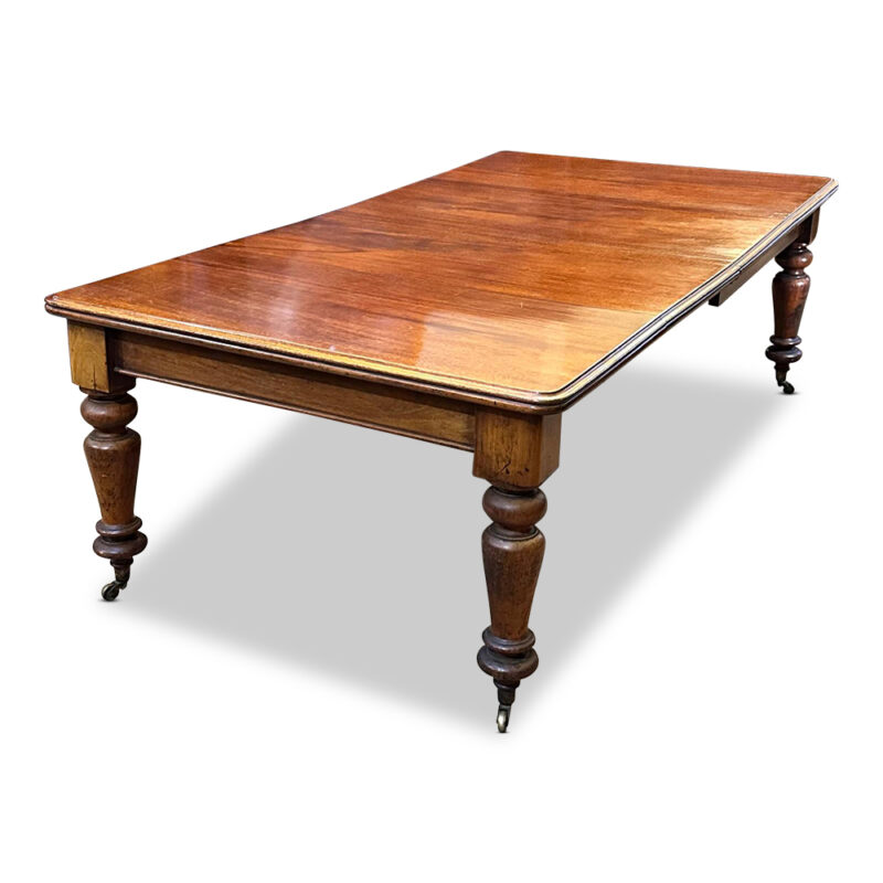 Mahogany 2 leaf dining table with turned legs c.1860