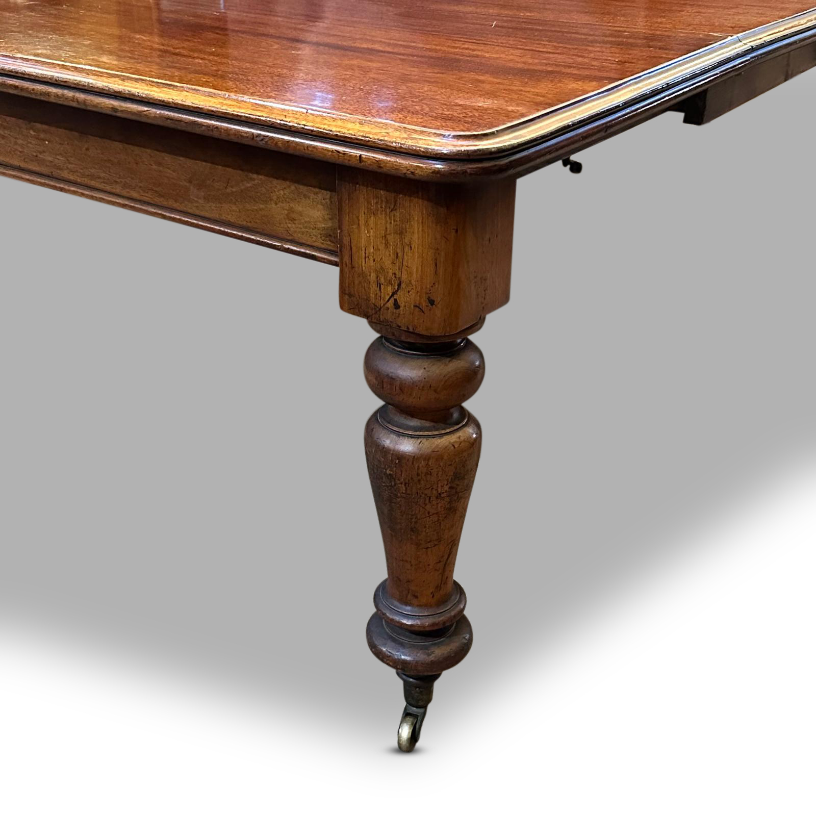 Mahogany 2 leaf dining table with turned legs c.1860