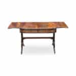 Regency style drop side mahogany table