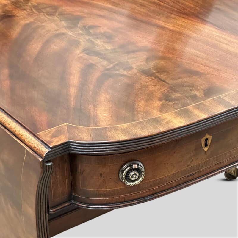 Regency style drop side mahogany table