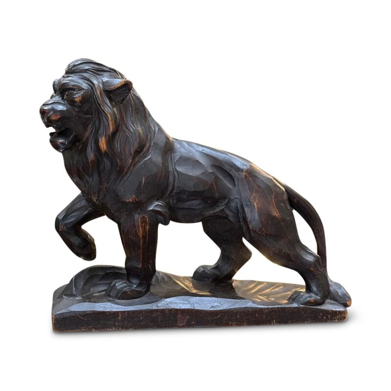 Ebonised carved lion figure c.1910