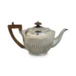 English sterling silver teapot with wooden handle by Charles Stuart Harris 1893