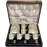 Boxed Royal Worcester set 6 coffee cups and saucers with sterling silver spoons c.1937
