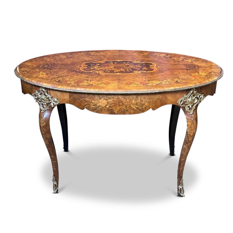 Fine quality French walnut oval centre table with marquetry inlays cabriole legs and ormolu mounts c.1870