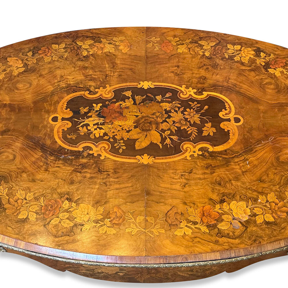 Fine quality French walnut oval centre table with marquetry inlays cabriole legs and ormolu mounts c.1870