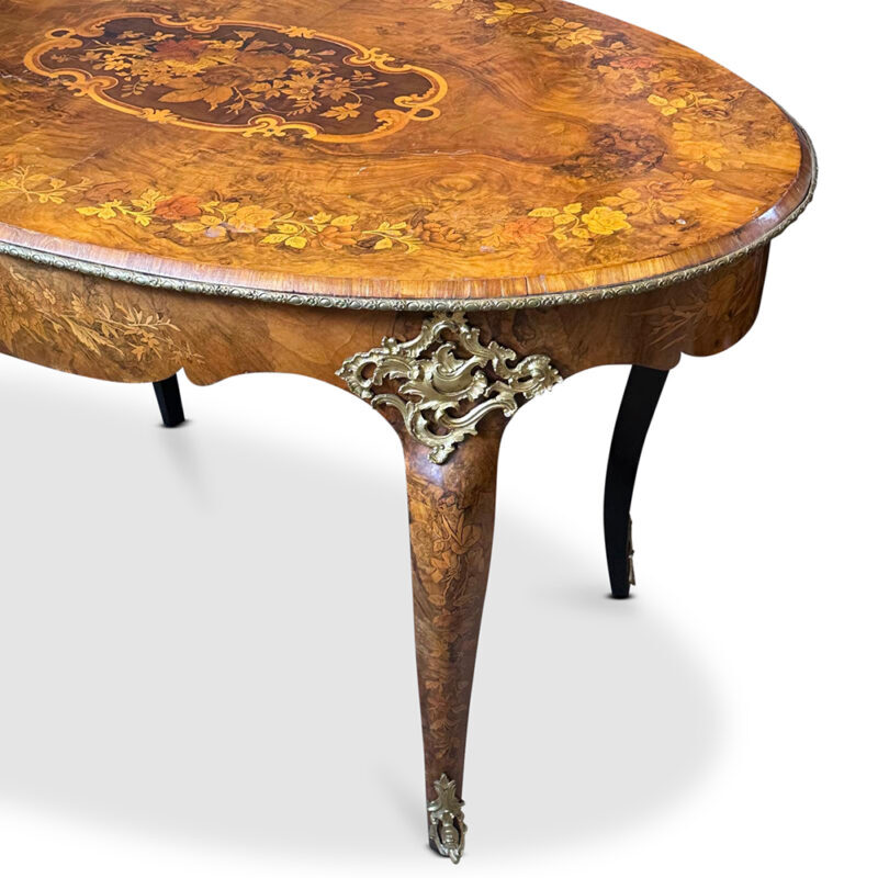Fine quality French walnut oval centre table with marquetry inlays cabriole legs and ormolu mounts c.1870