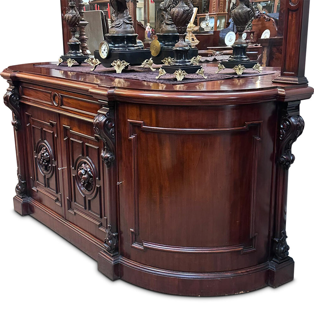 Grand English mahogany 4 door sideboard with ornate carvings and mirrored back c.1860