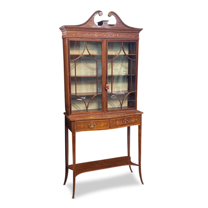 Superb English 2 door 2 drawer mahogany serpentine fronted display cabinet with fine marquetry inlays by Edwards & Roberts c.1890