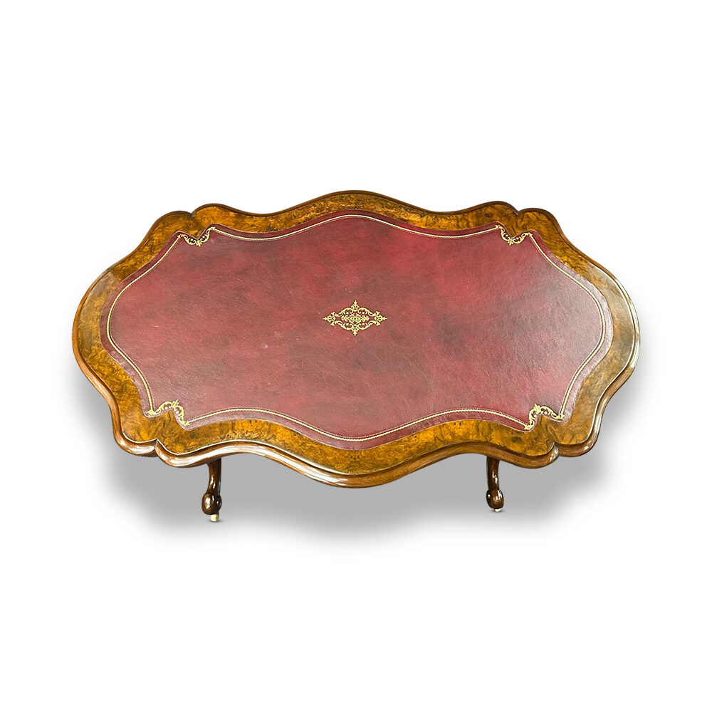English burr walnut writing desk with tooled leather top and carved stretcher base c.1870
