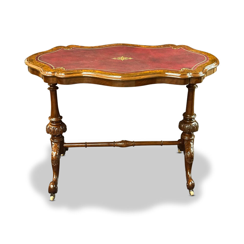 English burr walnut writing desk with tooled leather top and carved stretcher base c.1870