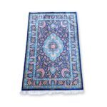Iran Qamar Saadi Poet Qum Persian Carpet signature 130 x 167cm in hues of royal blue, peacock blue, gold and pink with a white fringe.