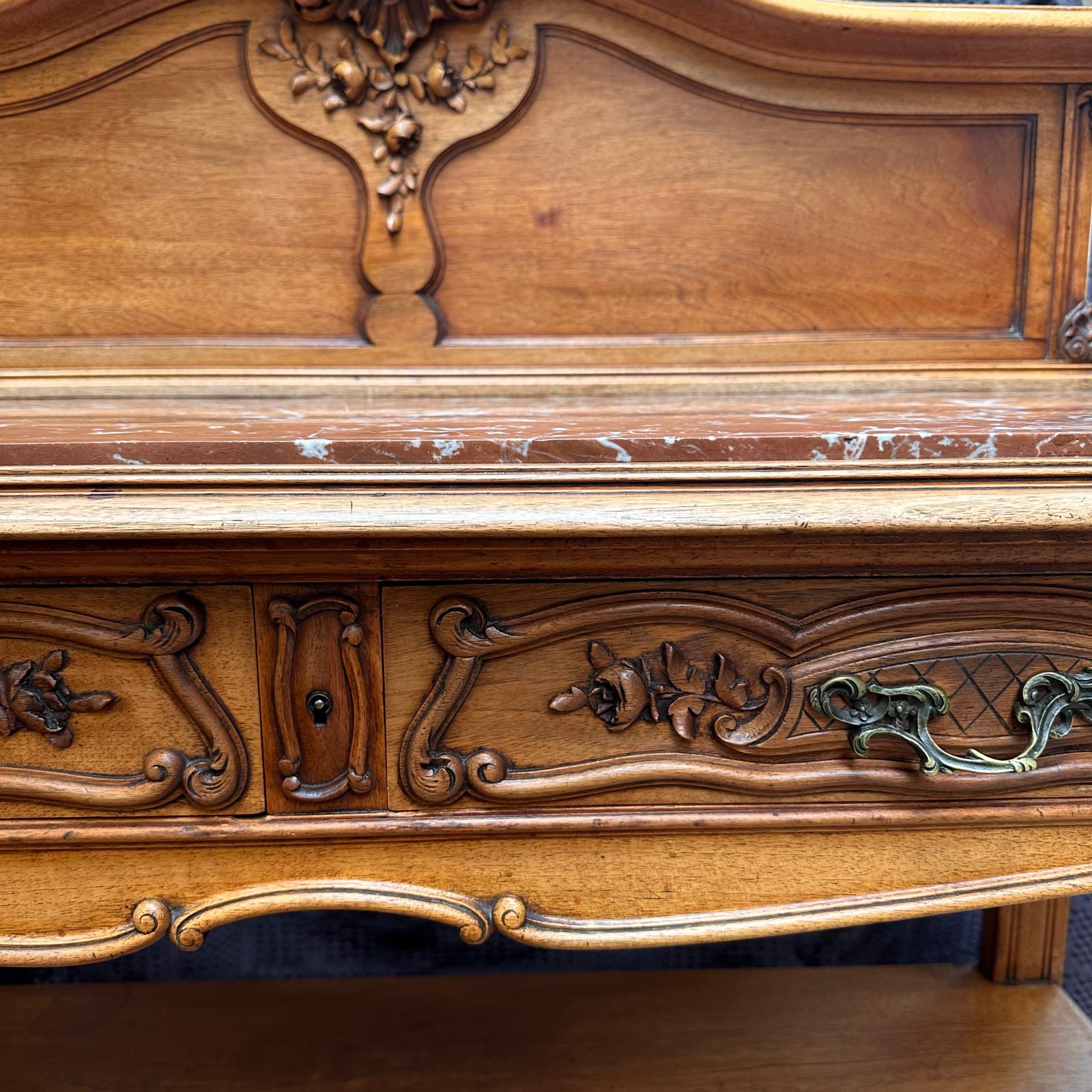 19th century French walnut rouge marble top two tier servery with carved cartouche and two drawers c.1890