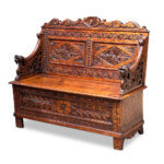 19th century beautifully carved oak settle with lift up storage c.1880
