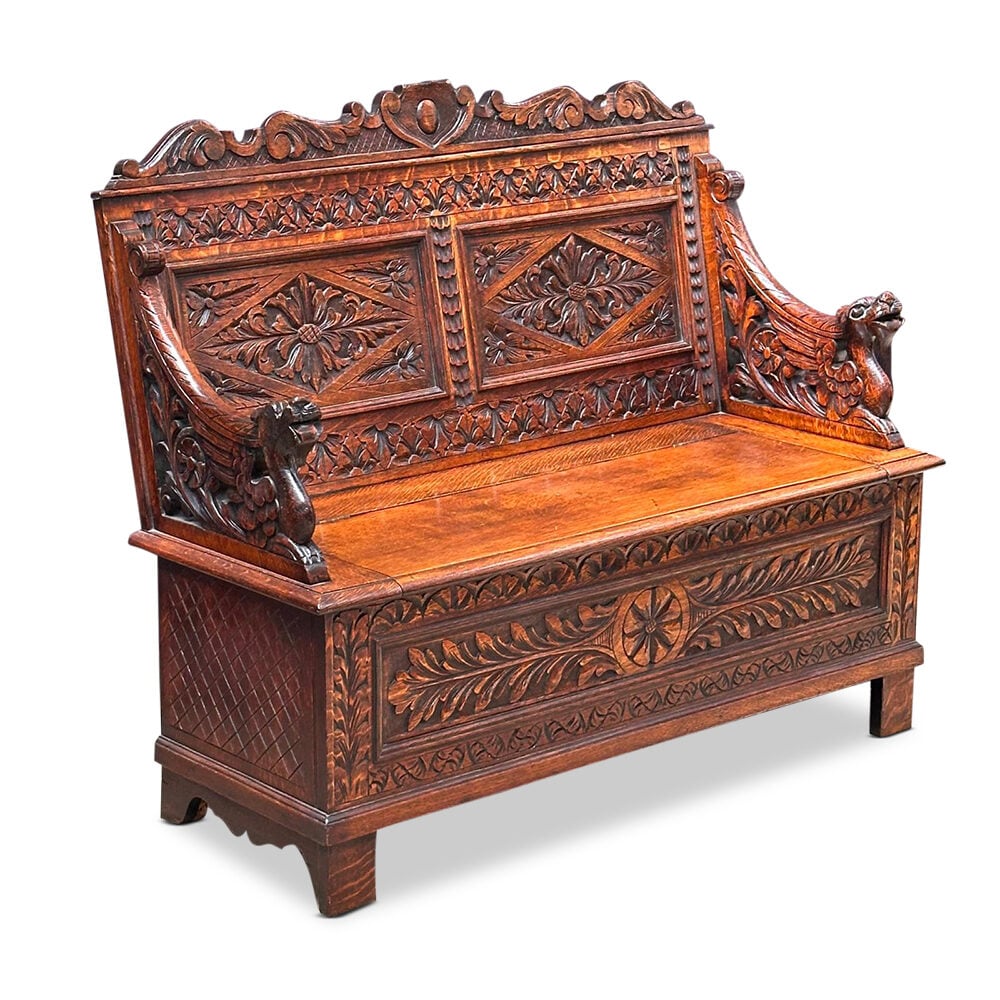 19th century beautifully carved oak settle with lift up storage c.1880