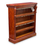 English mahogany open bookcase with carved corbels and tooled leather dust covers c.1850