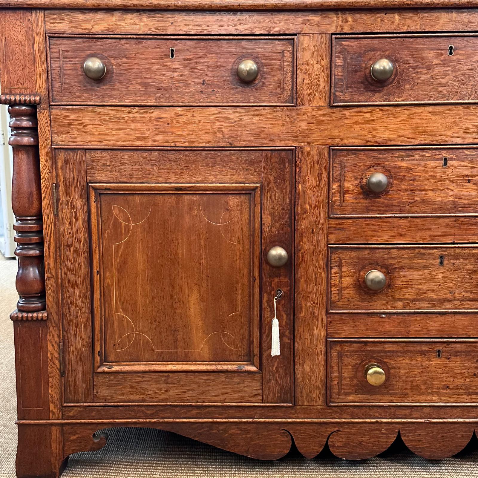 English oak 2 door 3 drawer kitchen dresser with string inlays c.1820