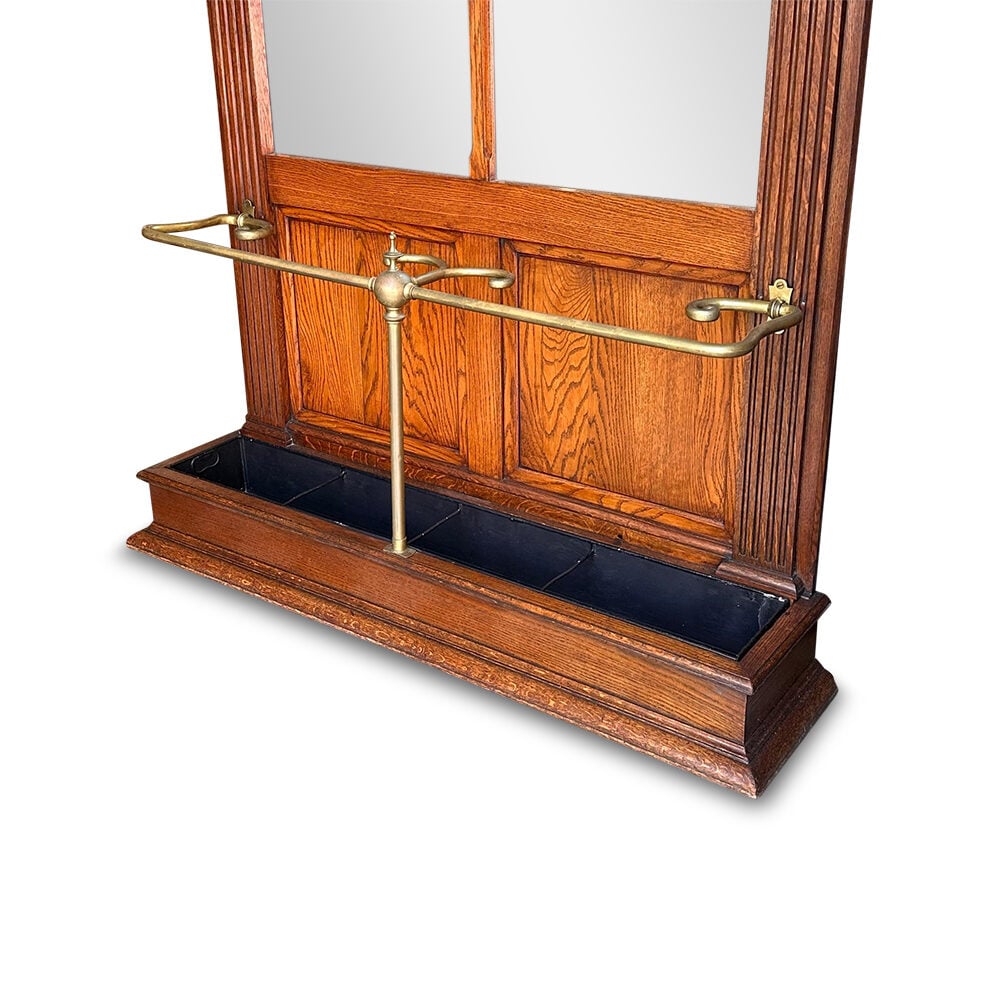 French oak hall stand with mirrored back and brass rails and hooks c.1870