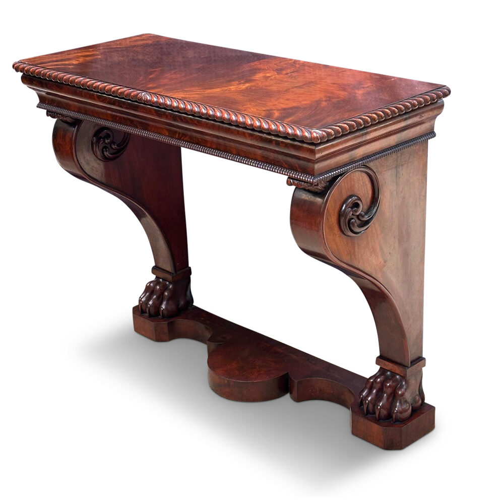 William IV mahogany console table with gadrooned edges and lion paw feet c.1860